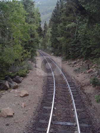 To use this stock image in your creative project, please select the size you need over to the right and click the "Add to Cart" button.
Your downloaded image will come with the Cutcaster watermark removed so don’t worry about the watermark you see on this page. Narrow gauge railroad tracks leading into distance stock photo, Taken on the Georgetown Loop Narrow Gauge Railway, in Colorado. by JKJ Anderson