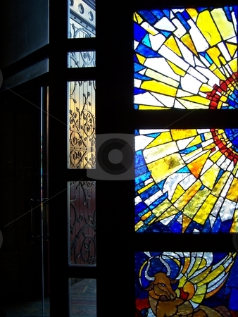 To use this stock image in your creative project, please select the size you need over to the right and click the "Add to Cart" button.
Your downloaded image will come with the Cutcaster watermark removed so don’t worry about the watermark you see on this page. Stained glass window stock photo, From a small church in South Yarra, Melbourne, Australia. by JKJ Anderson