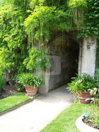 To use this stock image in your creative project, please select the size you need over to the right and click the "Add to Cart" button.
Your downloaded image will come with the Cutcaster watermark removed so don’t worry about the watermark you see on this page. Hidden arch at Worcester College, Oxford stock photo, This is an entryway into a corridor of Worcester College, Oxford. by JKJ Anderson
