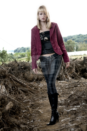 To use this stock image in your creative project, please select the size you need over to the right and click the "Add to Cart" button.
Your downloaded image will come with the Cutcaster watermark removed so don’t worry about the watermark you see on this page. fashion shoot walking towards you stock photo, Fashion shoot. She is walking amond dead tree stumps by Frenk and Danielle Kaufmann