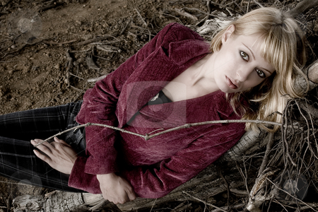 To use this stock image in your creative project, please select the size you need over to the right and click the "Add to Cart" button.
Your downloaded image will come with the Cutcaster watermark removed so don’t worry about the watermark you see on this page. Laying down looking at you stock photo, Fashion shoot in dead wood by Frenk and Danielle Kaufmann