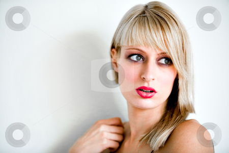 To use this stock image in your creative project, please select the size you need over to the right and click the "Add to Cart" button.
Your downloaded image will come with the Cutcaster watermark removed so don’t worry about the watermark you see on this page. Surpirised stock photo, Portrait of a beautiful blond girl by Frenk and Danielle Kaufmann