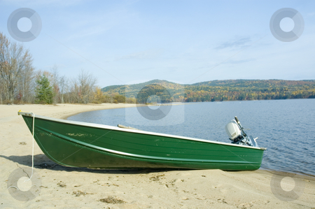 To use this stock image in your creative project, please select the size you need over to the right and click the "Add to Cart" button.
Your downloaded image will come with the Cutcaster watermark removed so don’t worry about the watermark you see on this page. Boat stock photo, A small green boat near the shore by Vlad Podkhlebnik
