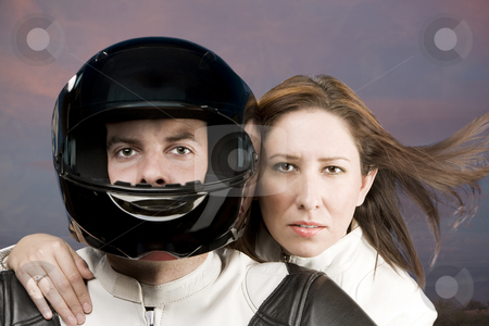 To use this stock image in your creative project, please select the size you need over to the right and click the "Add to Cart" button.
Your downloaded image will come with the Cutcaster watermark removed so don’t worry about the watermark you see on this page. Man and woman on a motorcycle stock photo, Man and woman on a motorcycle in studio by Scott Griessel