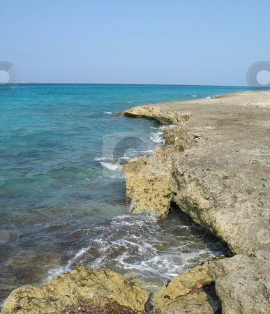 To use this stock image in your creative project, please select the size you need over to the right and click the "Add to Cart" button.
Your downloaded image will come with the Cutcaster watermark removed so don’t worry about the watermark you see on this page. Cliff over the caribbean ocean stock photo, Cliff over the caribbean ocean by Mbudley Mbudley