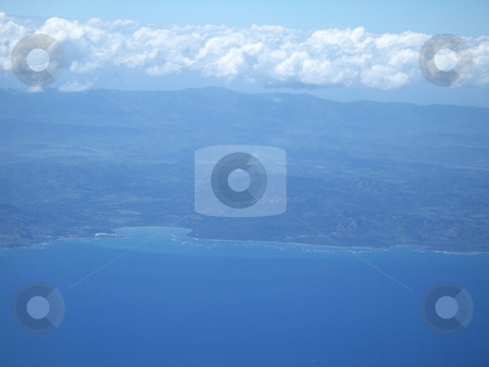 To use this stock image in your creative project, please select the size you need over to the right and click the "Add to Cart" button.
Your downloaded image will come with the Cutcaster watermark removed so don’t worry about the watermark you see on this page. Ocean and land viewed from a plane stock photo, Ocean and land viewed from a plane by Mbudley Mbudley