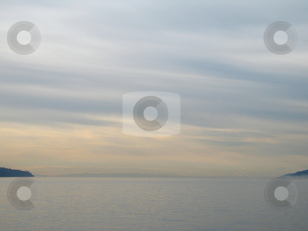 To use this stock image in your creative project, please select the size you need over to the right and click the "Add to Cart" button.
Your downloaded image will come with the Cutcaster watermark removed so don’t worry about the watermark you see on this page. Monochromatic sky and ocean stock photo, Monochromatic sky and ocean by Mbudley Mbudley