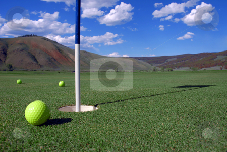 To use this stock image in your creative project, please select the size you need over to the right and click the "Add to Cart" button.
Your downloaded image will come with the Cutcaster watermark removed so don’t worry about the watermark you see on this page. Golf Hole and ball stock photo, by Brian Shephard