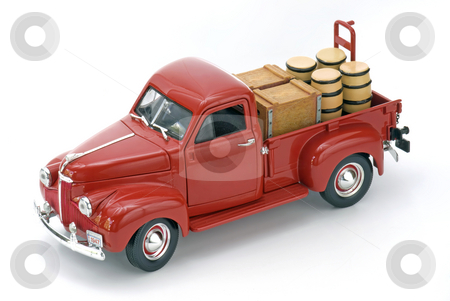 To use this stock image in your creative project, please select the size you need over to the right and click the "Add to Cart" button.
Your downloaded image will come with the Cutcaster watermark removed so don’t worry about the watermark you see on this page. Red Truck stock photo, Red Truck with Cart and Barrels on an Isolated Background by Brian Shephard