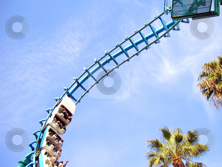 To use this stock image in your creative project, please select the size you need over to the right and click the "Add to Cart" button.
Your downloaded image will come with the Cutcaster watermark removed so don’t worry about the watermark you see on this page. Roller Coaster stock photo, Upside Down Roller Coaster by Brian Shephard