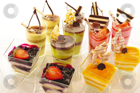 To use this stock image in your creative project, please select the size you need over to the right and click the "Add to Cart" button.
Your downloaded image will come with the Cutcaster watermark removed so don’t worry about the watermark you see on this page. Assorted colorful desserts stock photo, An assortment of colorful mousse desserts in cups. by Nicolaas Traut