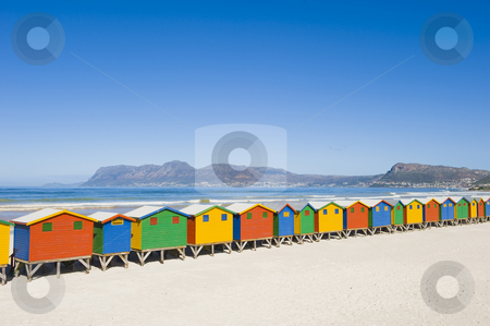 To use this stock image in your creative project, please select the size you need over to the right and click the "Add to Cart" button.
Your downloaded image will come with the Cutcaster watermark removed so don’t worry about the watermark you see on this page. Colorful dressing huts on the beach stock photo, Brightly colored dressing huts on Muizenberg beach near Cape Town. by Nicolaas Traut