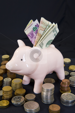 To use this stock image in your creative project, please select the size you need over to the right and click the "Add to Cart" button.
Your downloaded image will come with the Cutcaster watermark removed so don’t worry about the watermark you see on this page. Piggybank with various currency stock photo, Piggybank with various international currencies on a black background. by Nicolaas Traut