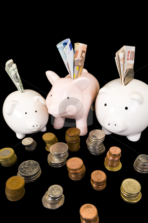 To use this stock image in your creative project, please select the size you need over to the right and click the "Add to Cart" button.
Your downloaded image will come with the Cutcaster watermark removed so don’t worry about the watermark you see on this page. Piggybank with various currency stock photo, Piggybank with various international currencies on a black background. Three pigs are showing the 3 major international currencies, Dollar, Euro and Pound Stirling. Dollar is in the smaller pig conceptualizing the weak currency. by Nicolaas Traut