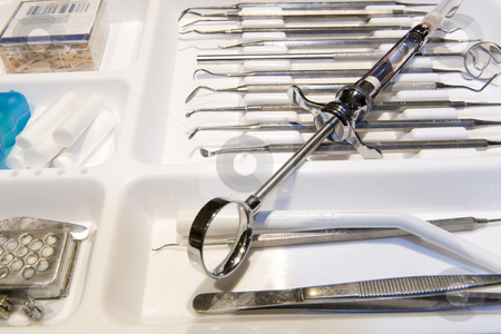 To use this stock image in your creative project, please select the size you need over to the right and click the "Add to Cart" button.
Your downloaded image will come with the Cutcaster watermark removed so don’t worry about the watermark you see on this page. Dentistry instruments stock photo, A variety of dentistry instruments used for dental procedures. by Nicolaas Traut