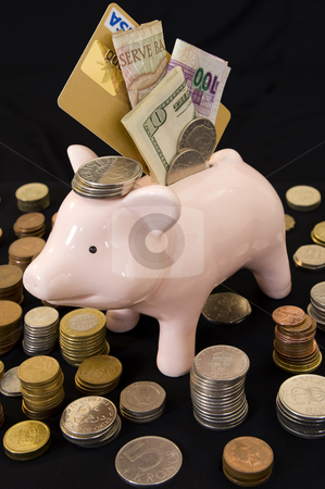 To use this stock image in your creative project, please select the size you need over to the right and click the "Add to Cart" button.
Your downloaded image will come with the Cutcaster watermark removed so don’t worry about the watermark you see on this page. Piggybank with various currency stock photo, Piggybank with various international currencies on a black background. Conceptual shot of maximum savings. by Nicolaas Traut