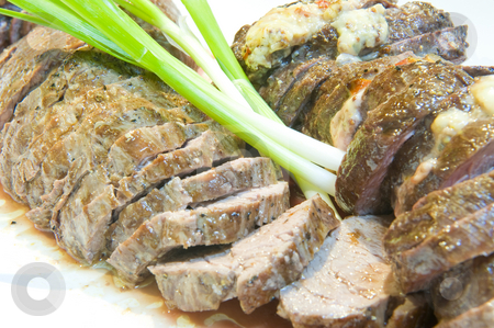 To use this stock image in your creative project, please select the size you need over to the right and click the "Add to Cart" button.
Your downloaded image will come with the Cutcaster watermark removed so don’t worry about the watermark you see on this page. Fillet steak stock photo, Delicious sliced fillet steak of a Kudu, medium done and served on a plate. by Nicolaas Traut