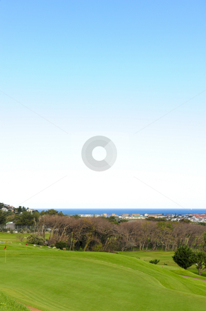 To use this stock image in your creative project, please select the size you need over to the right and click the "Add to Cart" button.
Your downloaded image will come with the Cutcaster watermark removed so don’t worry about the watermark you see on this page. Clovelly golf course stock photo, The picturesque Clovelly golf course, nestled between mountains and with views of the town of Fish Hoek and the ocean. by Nicolaas Traut