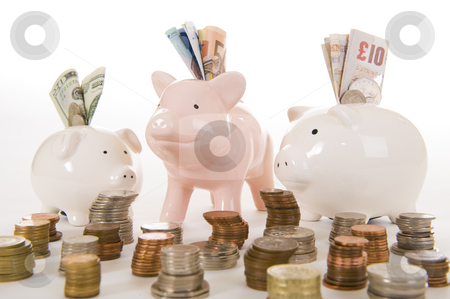 To use this stock image in your creative project, please select the size you need over to the right and click the "Add to Cart" button.
Your downloaded image will come with the Cutcaster watermark removed so don’t worry about the watermark you see on this page. Piggybank with various currency stock photo, Piggybank with various countries currencies on white background, signifying the major currencies. Dollar, Euro and Pound Stirling is visible with coins from all over the world. by Nicolaas Traut
