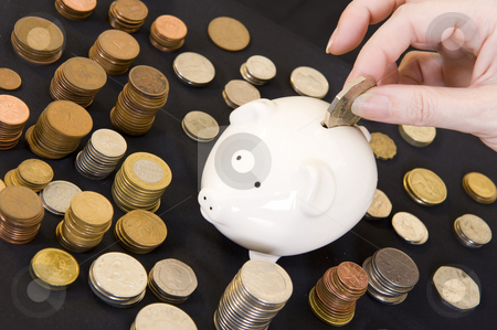 To use this stock image in your creative project, please select the size you need over to the right and click the "Add to Cart" button.
Your downloaded image will come with the Cutcaster watermark removed so don’t worry about the watermark you see on this page. Piggybank with various currency stock photo, Piggybank with various international currencies on a black background. by Nicolaas Traut