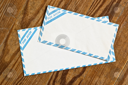 To use this stock image in your creative project, please select the size you need over to the right and click the "Add to Cart" button.
Your downloaded image will come with the Cutcaster watermark removed so don’t worry about the watermark you see on this page. Old airmail envelopes over wood. stock photo, Old airmail envelopes over an old wooden table. by Pablo Caridad