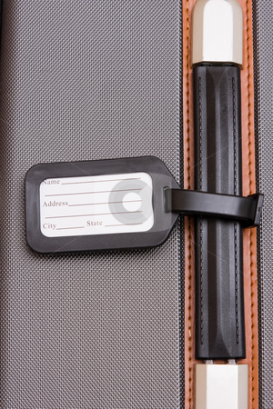 To use this stock image in your creative project, please select the size you need over to the right and click the "Add to Cart" button.
Your downloaded image will come with the Cutcaster watermark removed so don’t worry about the watermark you see on this page. Black Luggage Tag On Baggage stock photo, A black luggage tag on a handle on a bag by Nicholas Rjabow