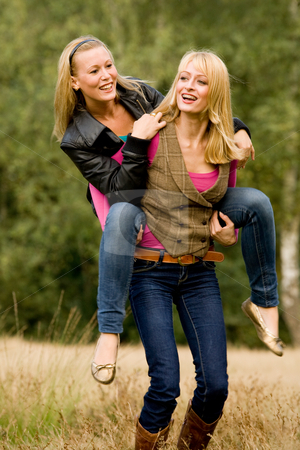 To use this stock image in your creative project, please select the size you need over to the right and click the "Add to Cart" button.
Your downloaded image will come with the Cutcaster watermark removed so don’t worry about the watermark you see on this page. Bunnyhop in a park stock photo, Two sisters in a park having fun by Frenk and Danielle Kaufmann