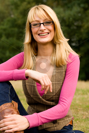 To use this stock image in your creative project, please select the size you need over to the right and click the "Add to Cart" button.
Your downloaded image will come with the Cutcaster watermark removed so don’t worry about the watermark you see on this page. The perfect girl stock photo, Beautifull young girl relaxing in a park by Frenk and Danielle Kaufmann