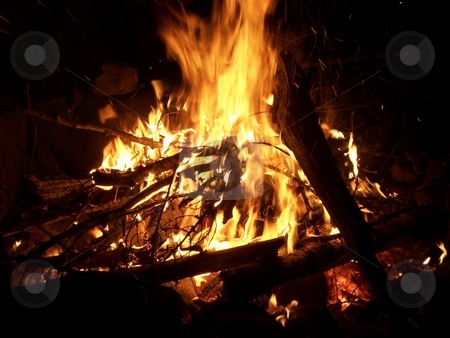 To use this stock image in your creative project, please select the size you need over to the right and click the "Add to Cart" button.
Your downloaded image will come with the Cutcaster watermark removed so don’t worry about the watermark you see on this page. Campfire stock photo, A campfire by Jeffrey Newell