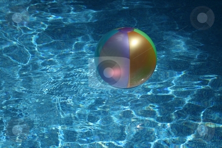 To use this stock image in your creative project, please select the size you need over to the right and click the "Add to Cart" button.
Your downloaded image will come with the Cutcaster watermark removed so don’t worry about the watermark you see on this page. A Summer Day stock photo, A beach ball flaoting in a swimming pool by Jeffrey Newell