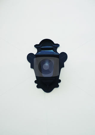 To use this stock image in your creative project, please select the size you need over to the right and click the "Add to Cart" button.
Your downloaded image will come with the Cutcaster watermark removed so don’t worry about the watermark you see on this page. Black Lantern stock photo, A simple black lantern light outside a house in Lisbon, Portugal. by Damian Keane