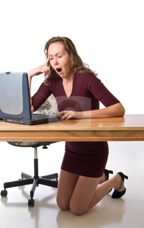 To use this stock image in your creative project, please select the size you need over to the right and click the "Add to Cart" button.
Your downloaded image will come with the Cutcaster watermark removed so don’t worry about the watermark you see on this page. Awakes with a yawn stock photo, Young woman tired from computer work by RCarner Photography
