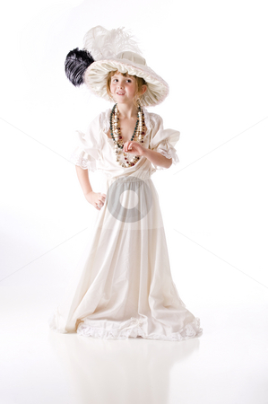 To use this stock image in your creative project, please select the size you need over to the right and click the "Add to Cart" button.
Your downloaded image will come with the Cutcaster watermark removed so don’t worry about the watermark you see on this page. Little girl dressing-up stock photo, Playing by wearing grandmas hat and clothes by RCarner Photography