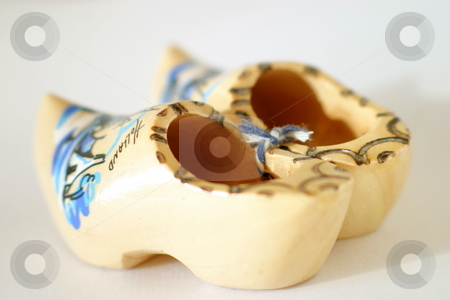 To use this stock image in your creative project, please select the size you need over to the right and click the "Add to Cart" button.
Your downloaded image will come with the Cutcaster watermark removed so don’t worry about the watermark you see on this page. Wooden Clogs stock photo, Painted wooden clogs with the word
