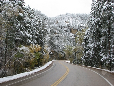 To use this stock image in your creative project, please select the size you need over to the right and click the "Add to Cart" button.
Your downloaded image will come with the Cutcaster watermark removed so don’t worry about the watermark you see on this page. Driving Threw Spearfish Canyon - Winter stock photo, Taken In Spearfish Canyon In South Dakota by Brian Meyer