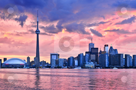To use this stock image in your creative project, please select the size you need over to the right and click the "Add to Cart" button.
Your downloaded image will come with the Cutcaster watermark removed so don’t worry about the watermark you see on this page. Toronto skyline stock photo, Scenic view at Toronto city waterfront skyline at sunset by Elena Elisseeva
