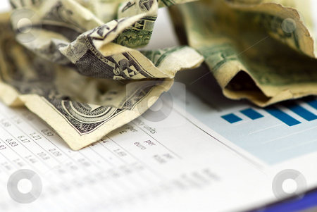 To use this stock image in your creative project, please select the size you need over to the right and click the "Add to Cart" button.
Your downloaded image will come with the Cutcaster watermark removed so don’t worry about the watermark you see on this page. Money finance chart stock photo, Crumpled us dollars on financial chart by Elena Elisseeva