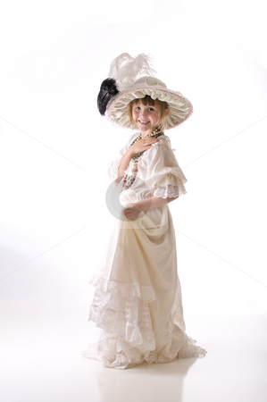 To use this stock image in your creative project, please select the size you need over to the right and click the "Add to Cart" button.
Your downloaded image will come with the Cutcaster watermark removed so don’t worry about the watermark you see on this page. Little girl heaven stock photo, Dressing up in grandma's hat and dress by RCarner Photography