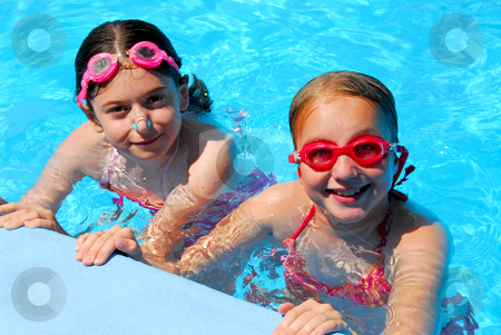 To use this stock image in your creative project, please select the size you need over to the right and click the "Add to Cart" button.
Your downloaded image will come with the Cutcaster watermark removed so don’t worry about the watermark you see on this page. Girls children pool stock photo, Two girls having fun in a swimming pool by Elena Elisseeva