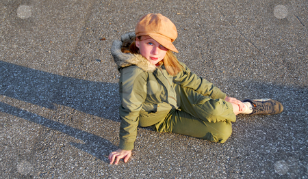 To use this stock image in your creative project, please select the size you need over to the right and click the "Add to Cart" button.
Your downloaded image will come with the Cutcaster watermark removed so don’t worry about the watermark you see on this page. Girl sit outside stock photo, Girl in fall clothes sitting on asphalt pavement by Elena Elisseeva