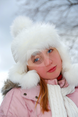 To use this stock image in your creative project, please select the size you need over to the right and click the "Add to Cart" button.
Your downloaded image will come with the Cutcaster watermark removed so don’t worry about the watermark you see on this page. Girl winter hat stock photo, Portrait of young girl wearing white winter hat outside by Elena Elisseeva