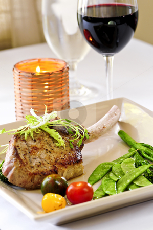To use this stock image in your creative project, please select the size you need over to the right and click the "Add to Cart" button.
Your downloaded image will come with the Cutcaster watermark removed so don’t worry about the watermark you see on this page. Veal dinner stock photo, Gourmet dinner of veal rib chop and vegetables by Elena Elisseeva