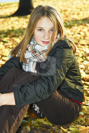 To use this stock image in your creative project, please select the size you need over to the right and click the "Add to Cart" button.
Your downloaded image will come with the Cutcaster watermark removed so don’t worry about the watermark you see on this page. Teenage girl in the fall stock photo, Portrait of a beautiful teenage girl in fall park by Elena Elisseeva