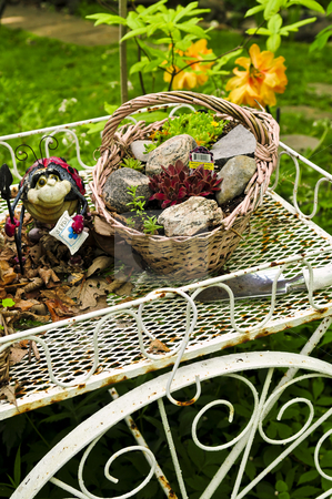 To use this stock image in your creative project, please select the size you need over to the right and click the "Add to Cart" button.
Your downloaded image will come with the Cutcaster watermark removed so don’t worry about the watermark you see on this page. Flower cart in garden stock photo, Flower cart with two baskets in summer garden by Elena Elisseeva