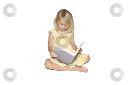 To use this stock image in your creative project, please select the size you need over to the right and click the "Add to Cart" button.
Your downloaded image will come with the Cutcaster watermark removed so don’t worry about the watermark you see on this page. Little Girl Studying Right stock photo, A young blonde girl sitting crosslegged while reading a textbook. Isolated on a white background by A Cotton Photo