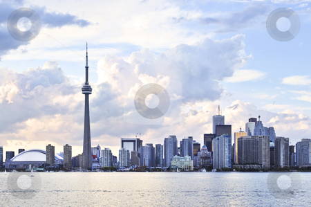 To use this stock image in your creative project, please select the size you need over to the right and click the "Add to Cart" button.
Your downloaded image will come with the Cutcaster watermark removed so don’t worry about the watermark you see on this page. Toronto skyline stock photo, Toronto city waterfront skyline in late afternoon by Elena Elisseeva