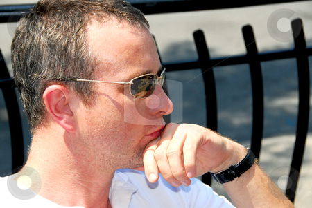 To use this stock image in your creative project, please select the size you need over to the right and click the "Add to Cart" button.
Your downloaded image will come with the Cutcaster watermark removed so don’t worry about the watermark you see on this page. Man sunglasses stock photo, Portrait of a man wearing sunglasses in outdoor cafe by Elena Elisseeva