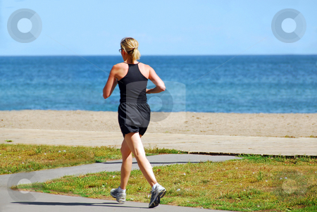 To use this stock image in your creative project, please select the size you need over to the right and click the "Add to Cart" button.
Your downloaded image will come with the Cutcaster watermark removed so don’t worry about the watermark you see on this page. Running woman stock photo, Young woman joggin by sea side in the summer by Elena Elisseeva