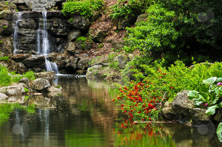 To use this stock image in your creative project, please select the size you need over to the right and click the "Add to Cart" button.
Your downloaded image will come with the Cutcaster watermark removed so don’t worry about the watermark you see on this page. Cascading waterfall and pond stock photo, Cascading waterfall and pond in japanese garden by Elena Elisseeva