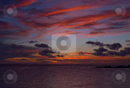 To use this stock image in your creative project, please select the size you need over to the right and click the "Add to Cart" button.
Your downloaded image will come with the Cutcaster watermark removed so don’t worry about the watermark you see on this page. Sea sunset stock photo, Sunset over the sea with nice vivid colors by Karin Claus